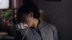 练束梅