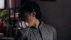 练束梅