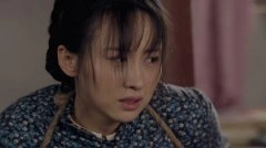 练束梅