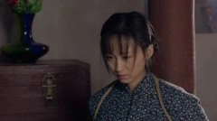 练束梅
