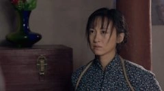 练束梅