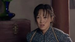 练束梅
