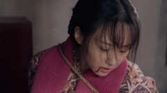 练束梅