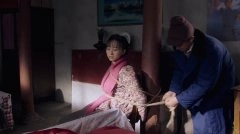练束梅